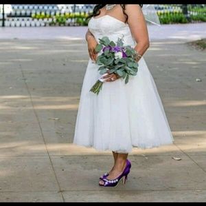 Ivory tea length wedding dress with matching veil